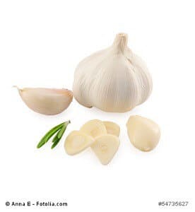Garlic bulb with cloves isolated on white